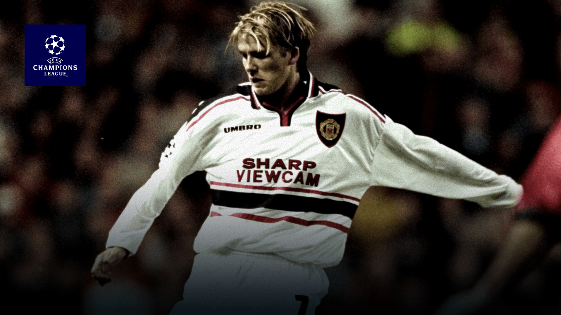 barcelona strikes late after beckham